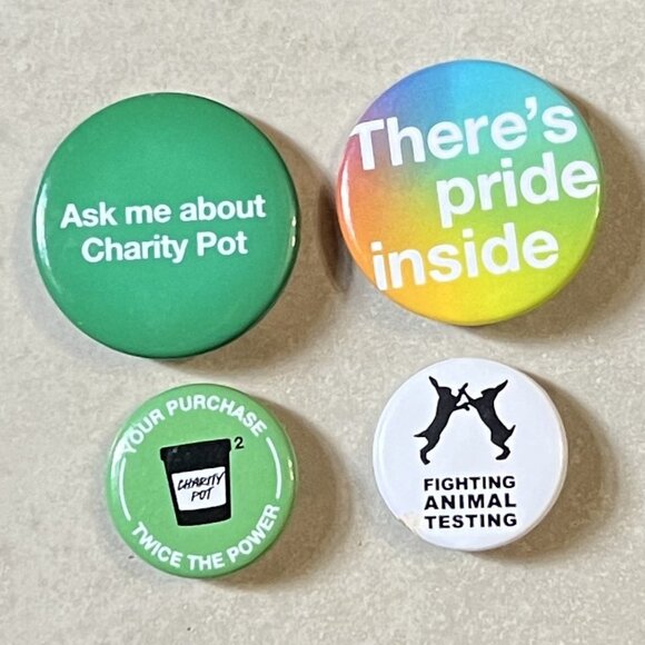 4 LUSH Cosmetics Staff Buttons: Charity Pot/Pride/Fighting Animal Testing Pins - Picture 1 of 2